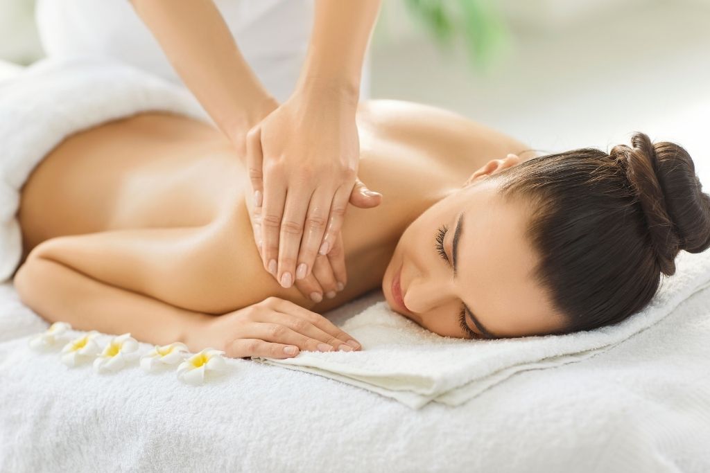 Professional shuolder massage treatment with aromatherapy, massage therapist doing oils massage